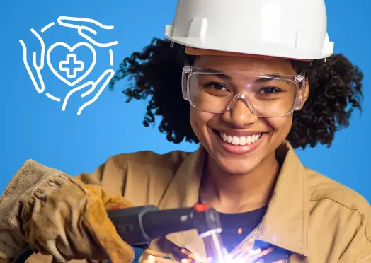 Salariée de l’industrie métallurgique équipée de protections, illustrant la portabilité de la mutuelle et le maintien de la couverture santé après un départ